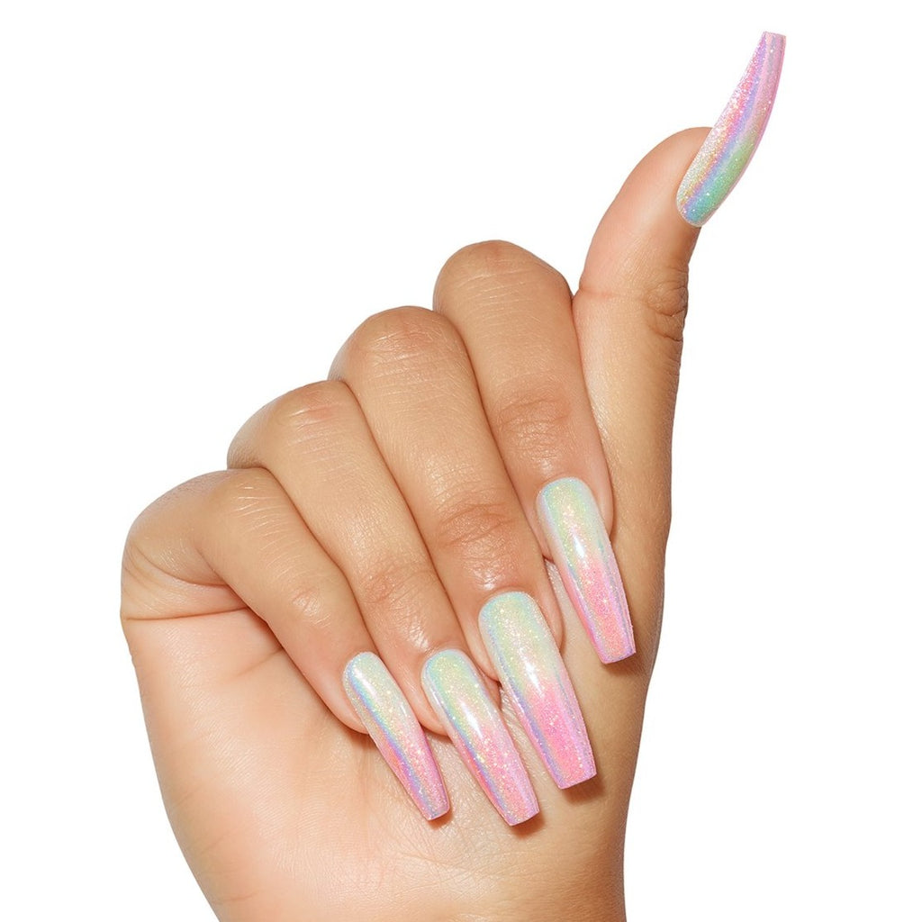 Close up of hand wearing pastel ombre stick on nails in extra long coffin