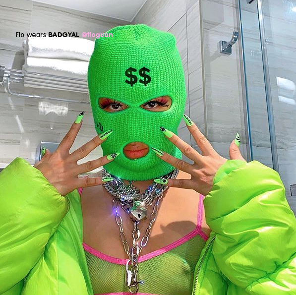 Influencer Floguan wears neon green ski mask and puffer jacket matched to Badgyal nails