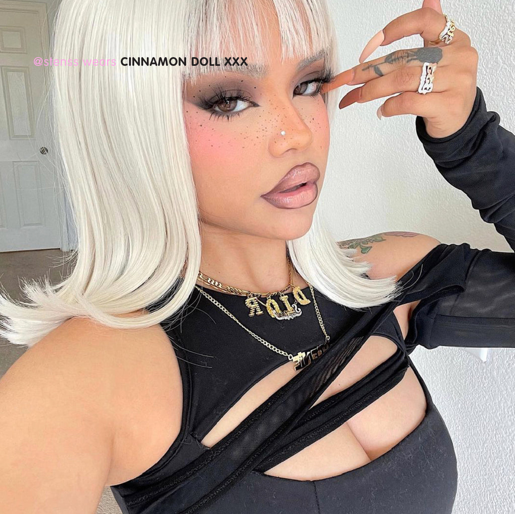 Influencer wearing Tres She instant acrylic press on nails in matte brown graduated shades extra long coffin shape