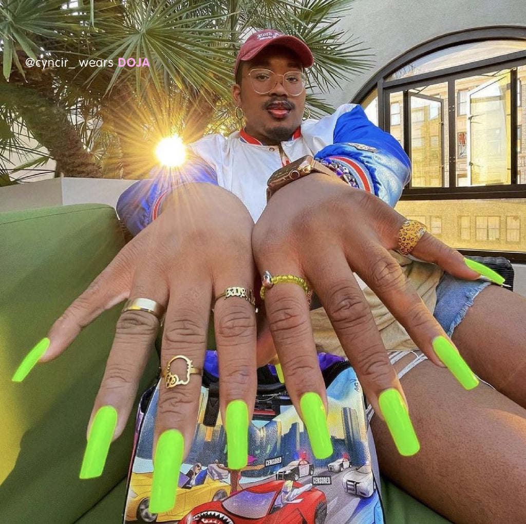 Influencer wears long square press on nails in bright green